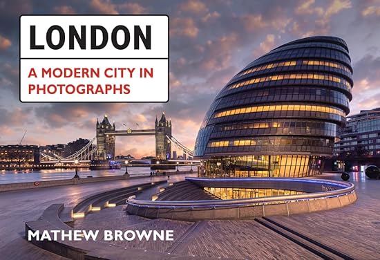 The cover image shows the title 'London: A Modern City in Photographs' along with a photograph of London's skyline featuring iconic buildings such as the Tower Bridge and a modern architectural building at dusk.