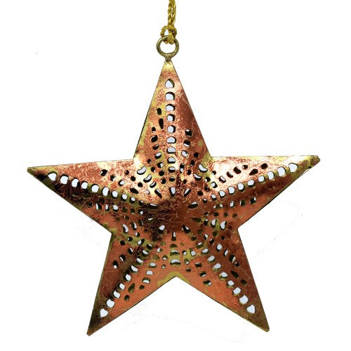 Decorative star-shaped ornament with cut-out patterns on a white background