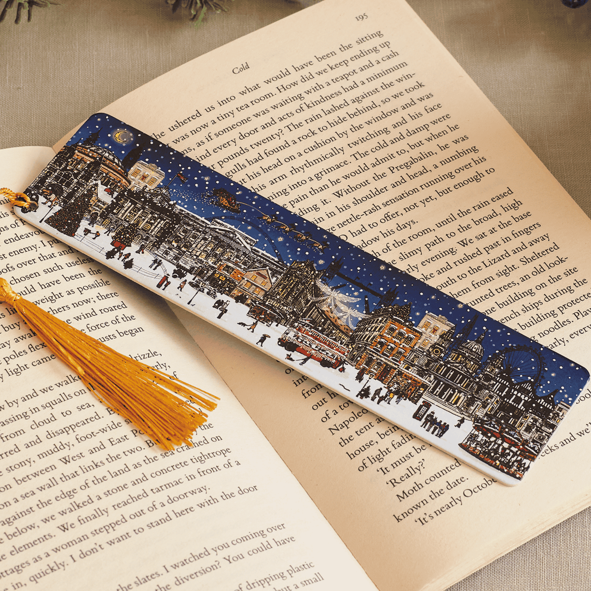 Decorative bookmark with tassel on an open book