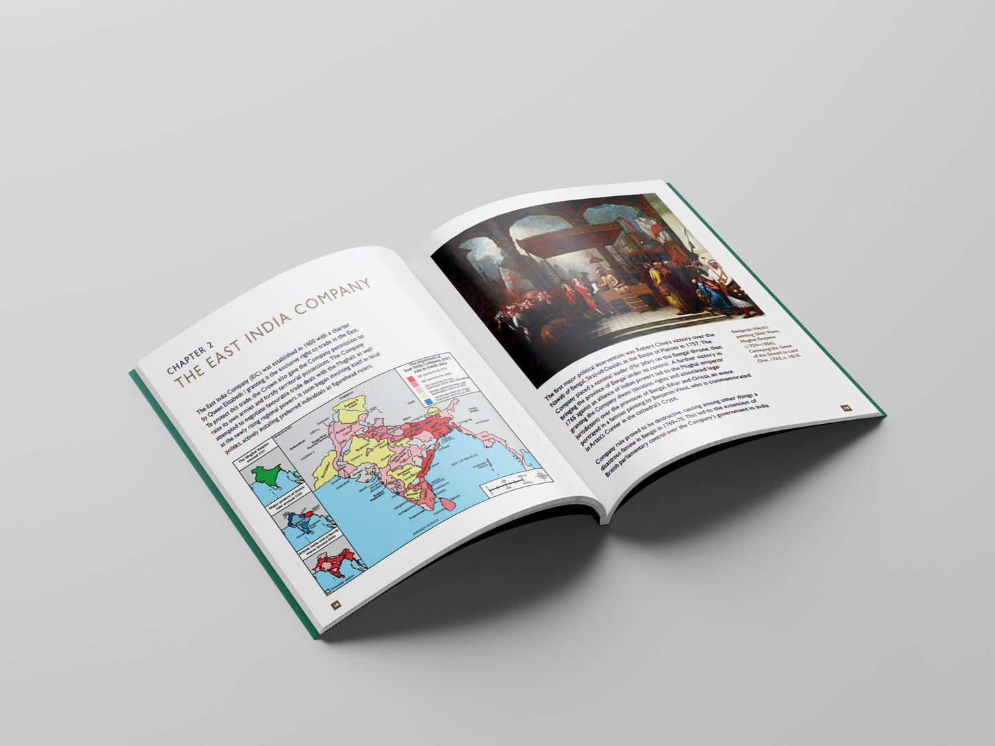 Open book on a gray background with illustrations and text