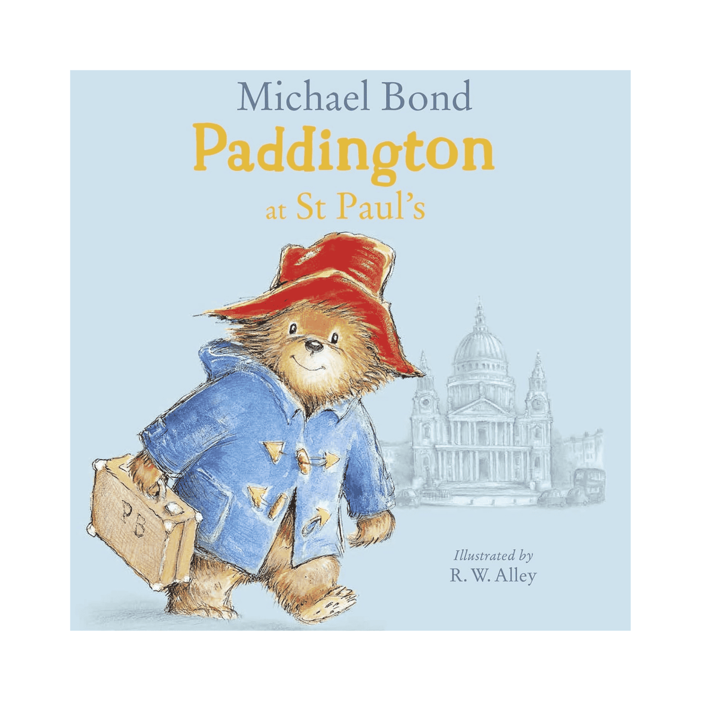 Book cover of 'Paddington at St Paul's' featuring Paddington Bear with a suitcase and red hat against a light blue background.